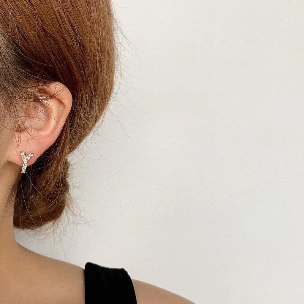 Korean Micro-Diamond Trendy Letter Stud Earrings: Elegant, High-End Accessories for Women's Unique Style.