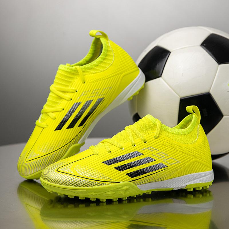 2025 new children's football shoes boys and girls broken nails T people grass students game training football shoes 31-40