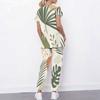 Women Plus Size Printed Scrub Set Crisscross Cutout Neck Short Sleeve Pockets Top Long Pants