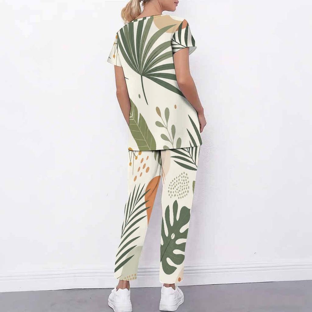 Women Plus Size Printed Scrub Set Crisscross Cutout Neck Short Sleeve Pockets Top Long Pants
