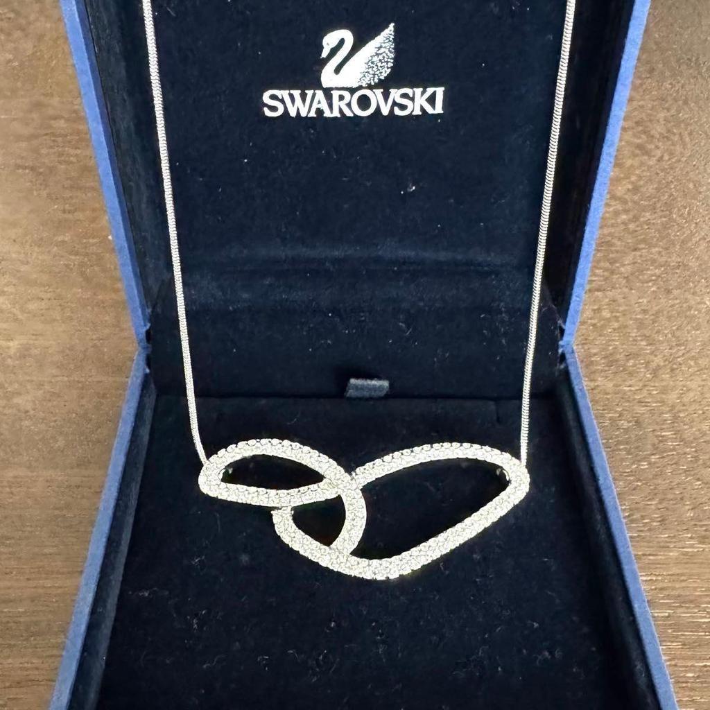 Used Good conditionSWAROVSKI Swarovski double oval necklace crystal silver color storage bag included