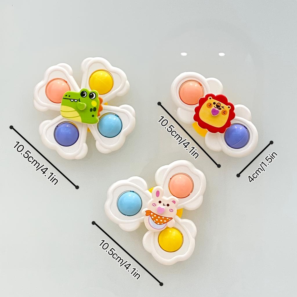 A Set of Three Cartoon Animal Suction Cup Spinning Tops for Babies, Designed To Enhance Hand-Eye Coordination During Early Education