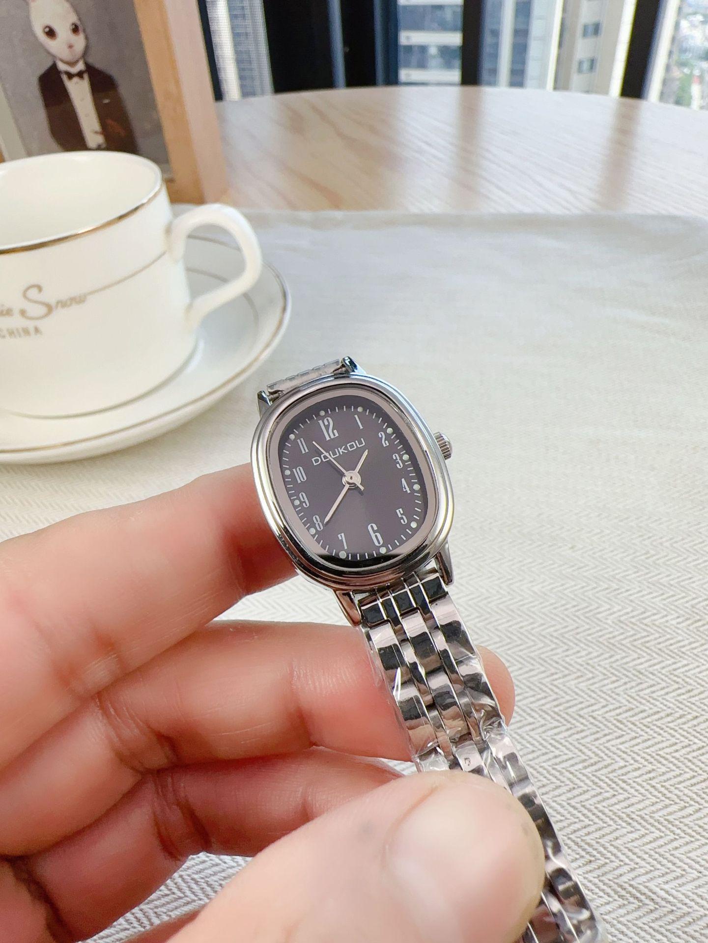 

Women s Minimalist Quartz Watch with Elliptical Dial and Digital Markers, Steel Band, Small Wristwatch