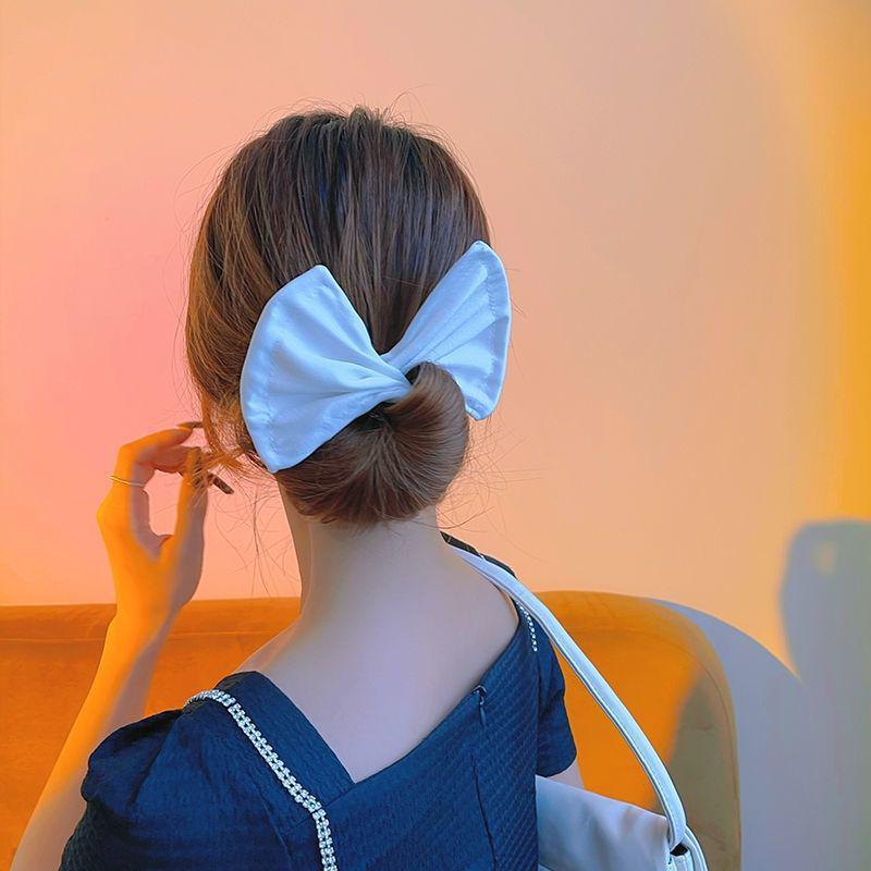 Trendy Magic Hair Twister Clip: Easy Bun & Bow Styling Tool