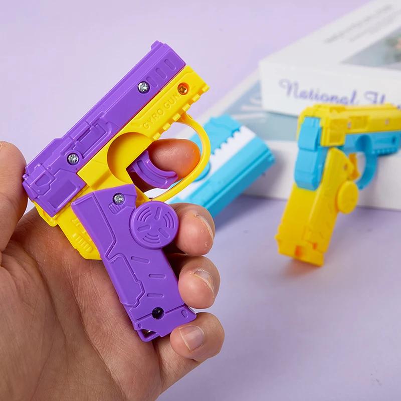 Fingertip Gyro Gun Rotating Carrot Gun 3D Gravity Mini Gravity Small Pistol Automatic Reloading Children's Reward Gift Toy