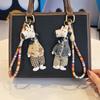 Cute Dressed Hippo Bag Charm, Handmade Fabric Hippo Keychain with Colorful Braided Rope