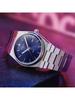 PRX T137.410.33.021.00 Stylish, Elegant Stainless Steel Quartz Men's Watch with Golden Round Dial Date Display. Men's T137.410.11.041.00