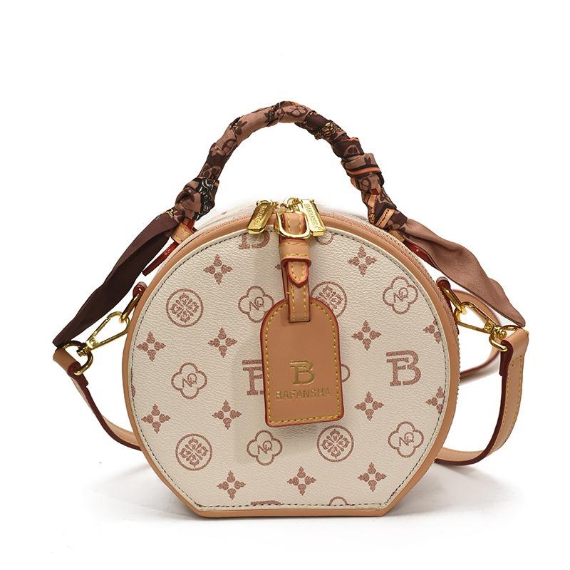 Diagonale Überspannung Nische runde Kuchen Tasche Damen vielseitige Ein-Schulter Messenger Bag High-End kleine runde Tasche Frühling und Sommer Damen Tasche