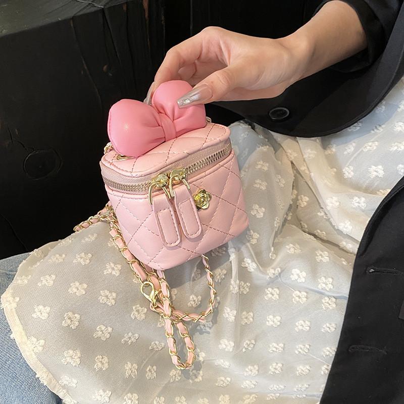 And Elegant Chic Girls Mini Handbag Featuring A Fashionable Bow And Strap Chain