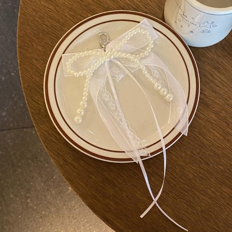 Eleganter Schlüsselanhänger mit Perlen, Handyanhänger, einzigartiger Schlüsselanhänger, Schleife, Taschenanhänger, Accessoire für Geldbörse und Rucksack