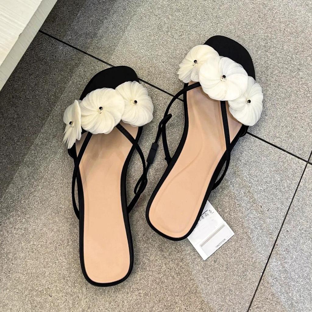 Leather French Niche Flower One-word Cool Slippers Women's Outer Wear 2025 Spring and Summer New Versatile Flat Sandals