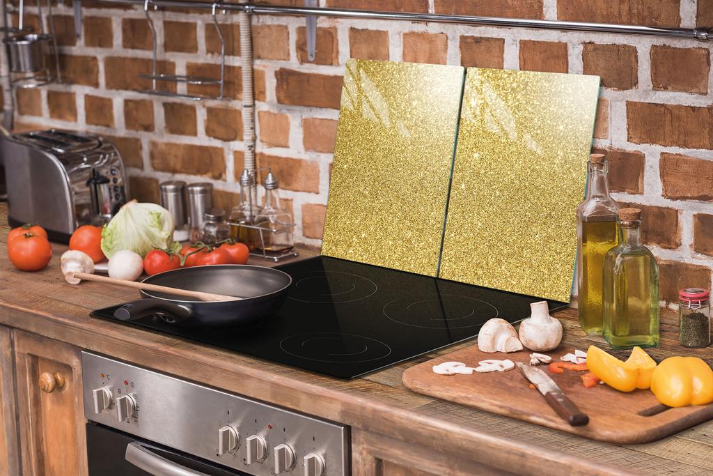 PLACA PROTECTORA DE CRISTAL PARA COCINA 2x35x52 DORADA