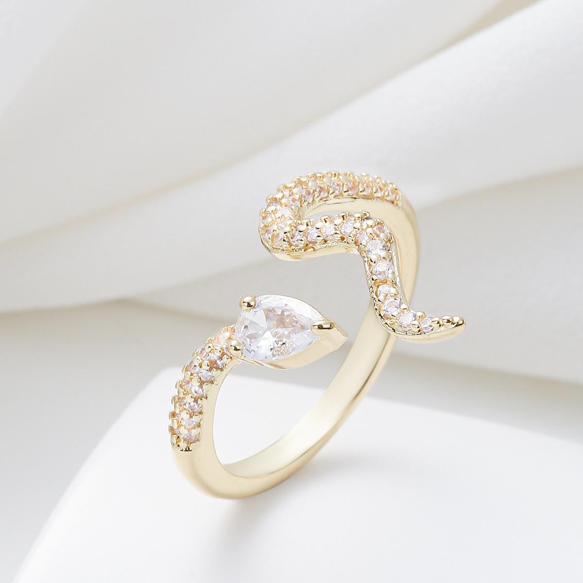 

Korean version of Xiaoqing Xinfeng women s ring, personalized winding snake inlaid zircon ring, opening adjustable index finger ring Opening adjustable