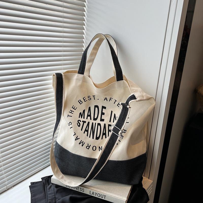 

College style alphabet canvas bag women s new trendy fashion tote bag casual large capacity messenger bag чёрный
