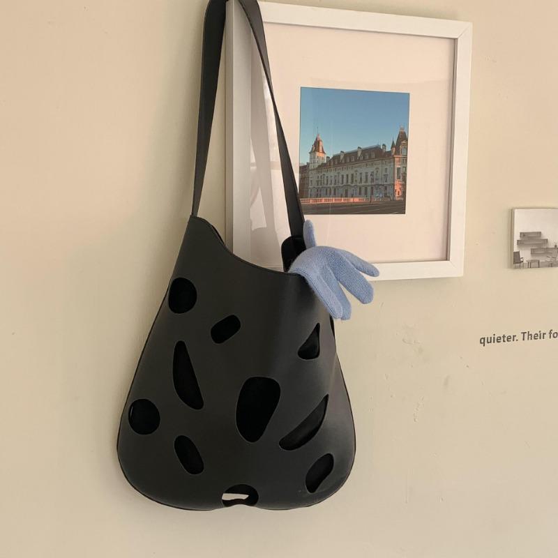 Irregular hollow shoulder bag women's niche design commuter bag large capacity new retro wind tote bag women