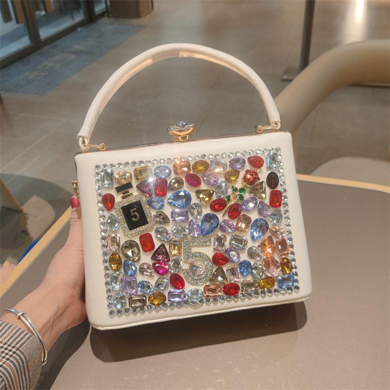 Light Luxury New Leather Fashionable Rhinestone Retro Clip Niche Handbag