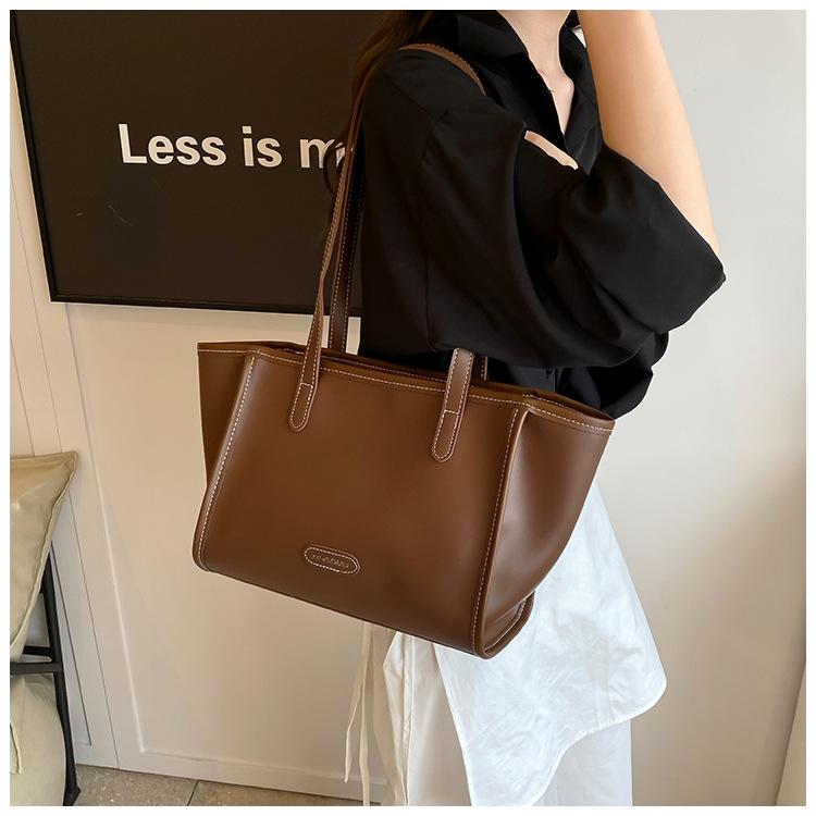 

Вместительная сумка для поездок на работу, женская, новая модная, простая сумка-тоут, высококлассная ретро-сумка через плечо 45*10*23 коричневый