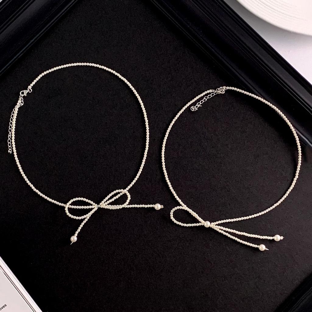 Super fairy bow pearl necklace fashion design collarbone chain colored stone light luxury Internet celebrity accessories neck chain