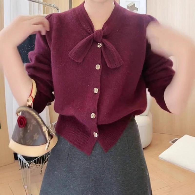 Spring new simple and versatile knitted cardigan solid color top bow design sense long sleeve sweater jacket