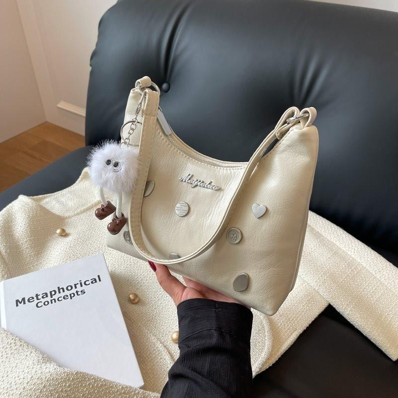 

Elegant Silver Shoulder Bag For Women With Unique Dumpling Shape And Stylish Design OffWhiteDecorated