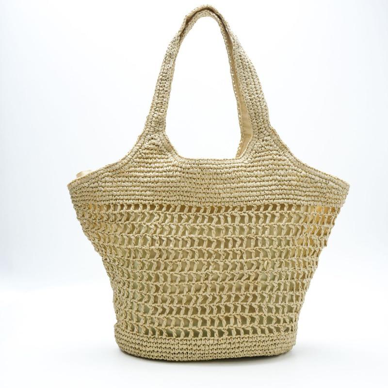 New shoulder hollow straw bag women's leisure handheld straw bag handwoven bag seaside vacation beach bag