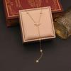 Long Y-shaped stainless steel necklace with eight-pointed star pendant, elegant clavicle chain jewelry