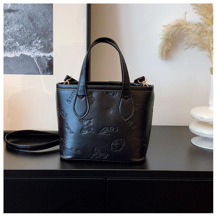 

Printed solid color 2025 fashionable foreign style new large capacity summer atmospheric texture crossbody portable bucket bag women чёрный