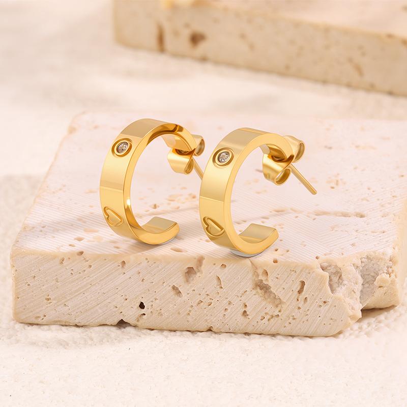 Titanium Steel Stud Earrings - Curved Four-leaf Clover Heart-shaped Diamond-studded Earrings for Women, Fashionable and Versatile Ear Studs.