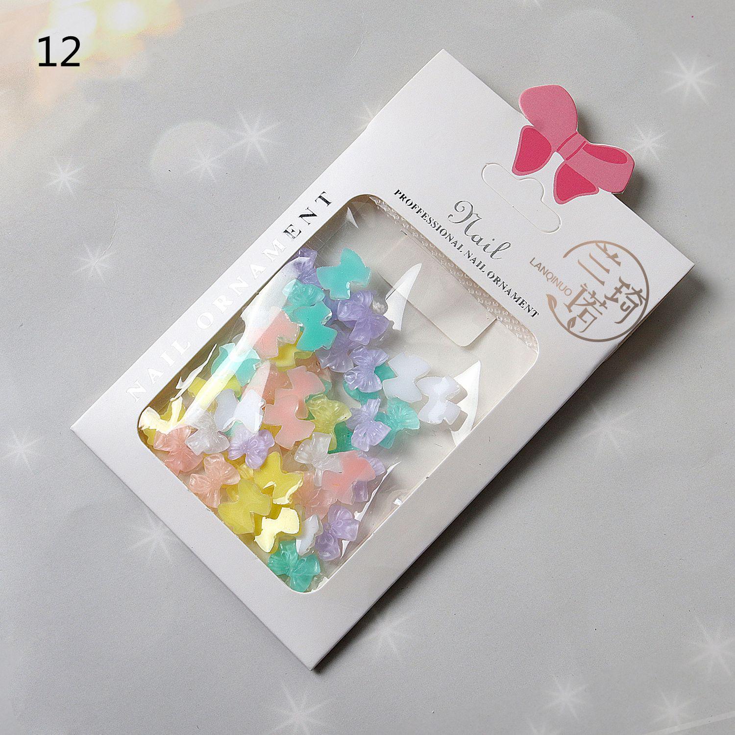 

Аксесуари для нігтів зі смоли: Білі квіти, перлини-метелики, сталеві намистини, кришталеві ведмедики, мікс ромашок