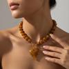 European and American retro amber ins big love pendant necklace, simple and exaggerated Maillard smudged round bead necklace