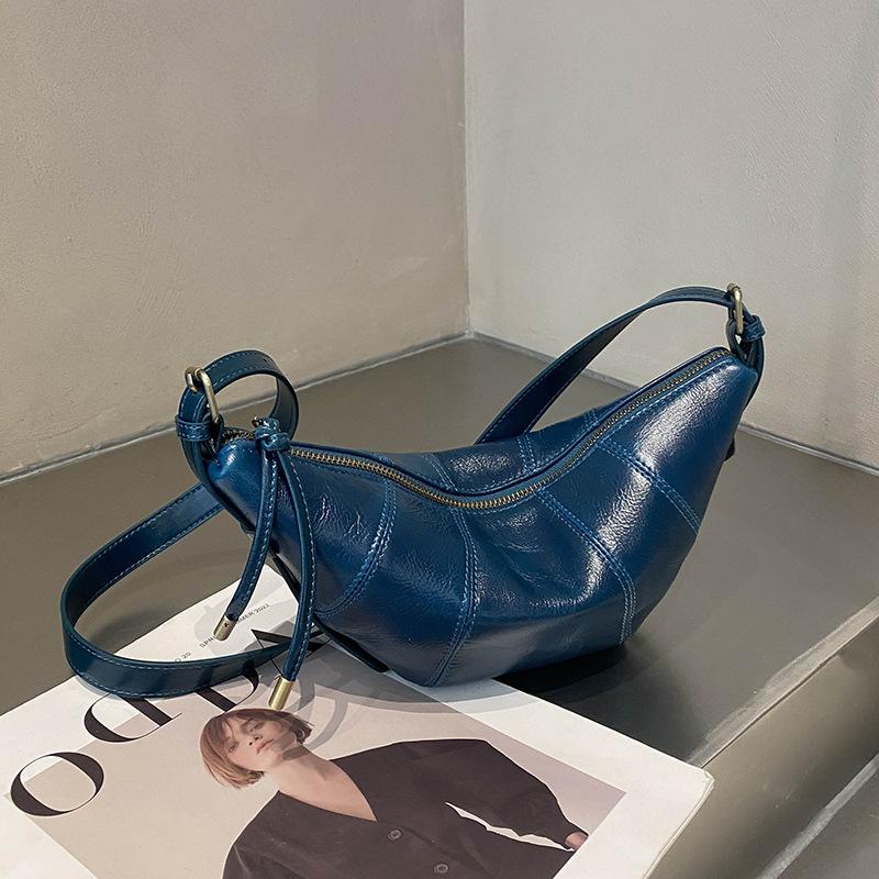 

Высококлассная и нишевая сумка-мессенджер New Moon, изготовленная из коровьей кожи в форме пельменей и рогов One Size синий