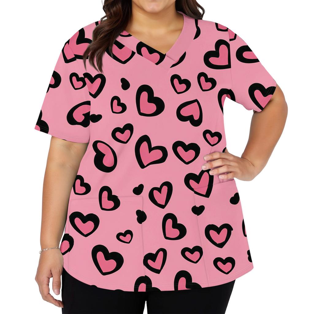 Modisches Damen-Arbeitsoberteil mit V-Ausschnitt und kurzen Ärmeln, Seitenschlitzen, Taschen und verziert mit Valentinstag-Herzelementen und Herzprints.