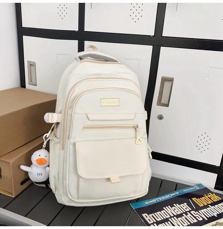 Schoolbag high-value simple casual couple travel backpack large capacity junior high school students multi-compartment backpack men