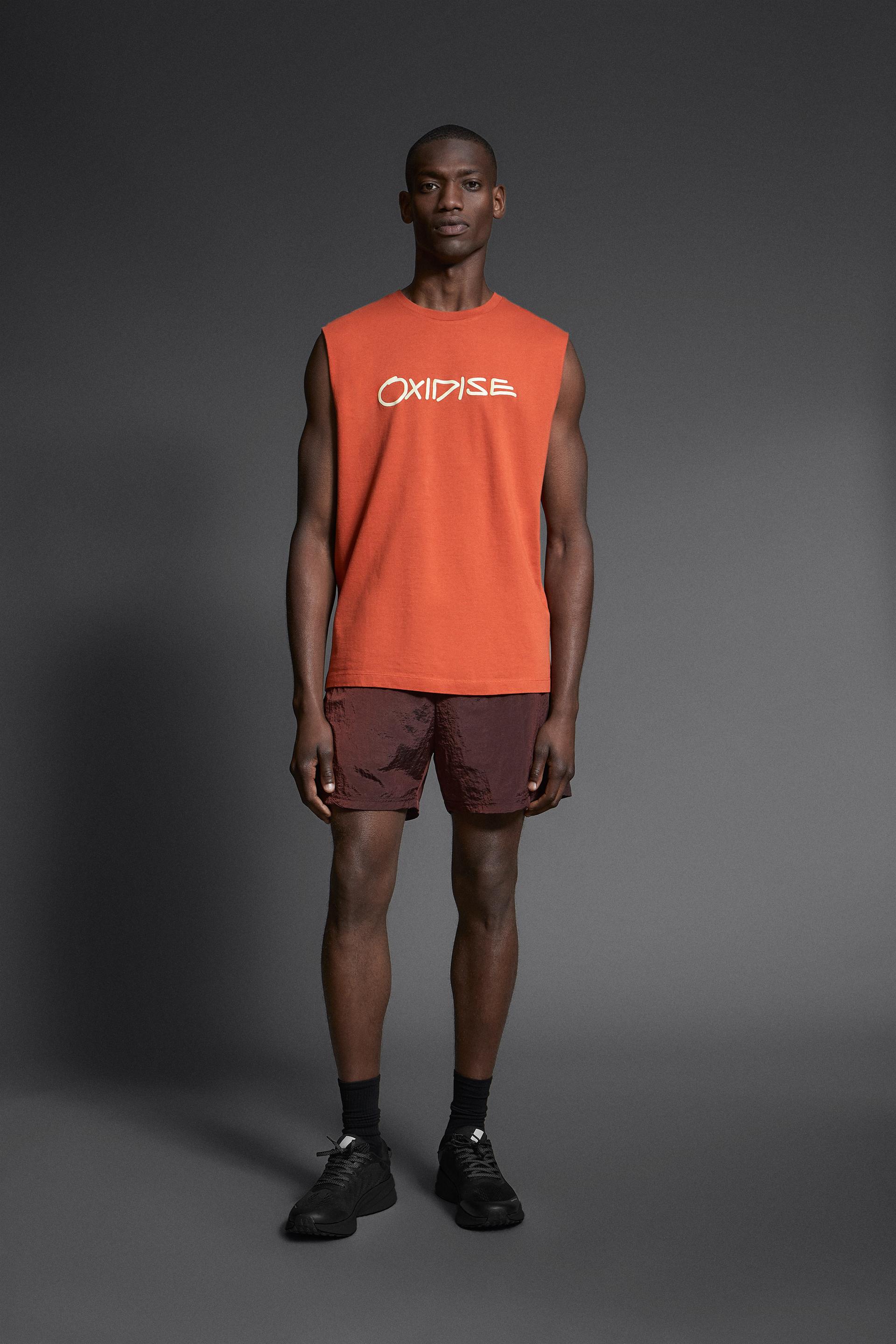 

TANK TOP WITH SLOGAN