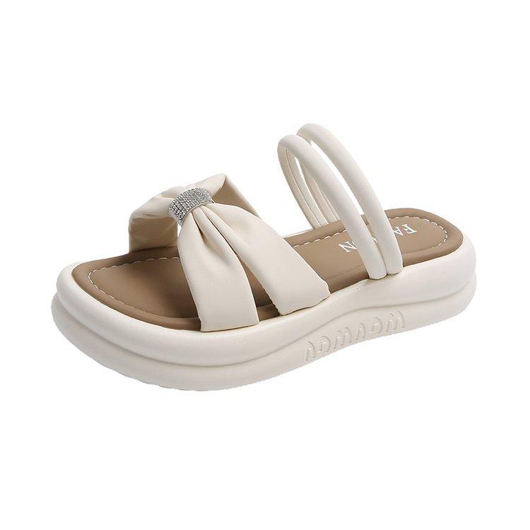 

Cool slippers women s summer outer wear 2025 new Korean version of one-word drag high-end sense rhinestone thick-bottomed beach slippers women 40