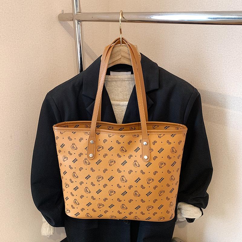 

Корейская повседневная мода сумка большой вместимости женская 2025 лето новая простая и модная высокоценная портативная сумка-тоут