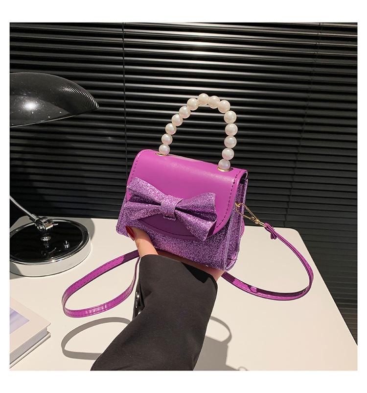 

Сумка на плечо с цветными блестками, бантовые аксессуары, жемчужная сумочка в стиле принцессы, корейская версия мини-сумки контрастного цвета небольшого квадрата фиолетовый