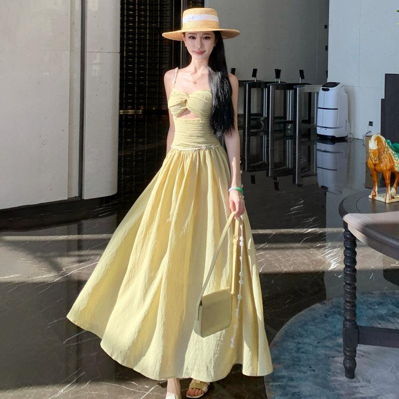 Spring and Summer Seaside Vacation Yellow Hollow Suspender Temperament Dress Waist Thin Beach Long Skirt