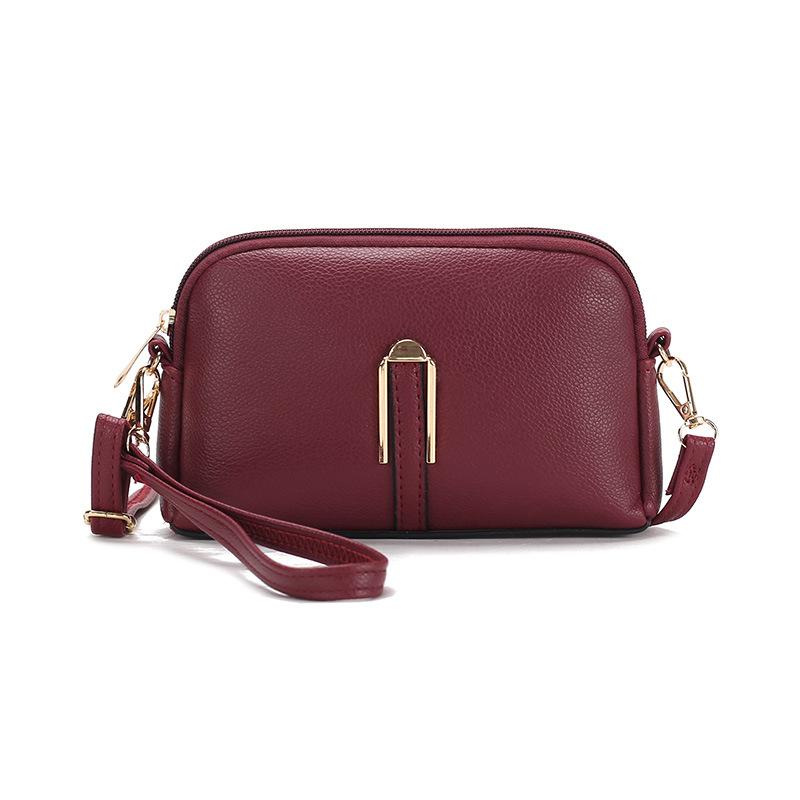 New Women's Bag Solid Color Hand held Mobile Phone Bag Korean Version Simple and Fashionable One Shoulder Crossbody Bag High End Small Bag