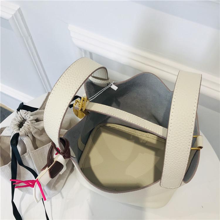 2024 Cowhide Lychee Pattern Vegetable Basket with Gold Hardware and Button - Mother-and-Child Bucket Handbag