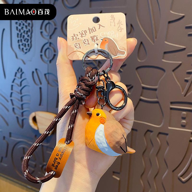 Original wood carving wind bird keychain pendant creative resin pearl bird couple keychain schoolbag pendant