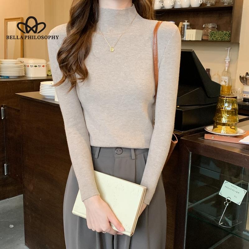 Nuevo invierno ajustado tejido de punto Color sólido cuello redondo señoras moda camisa por el trasero suéter mujer ropa