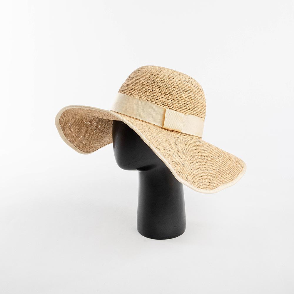 Spring and summer fashion casual hemming webbing hand-woven thin raffia big eaves hat women's sunscreen sunshade foldable straw hat