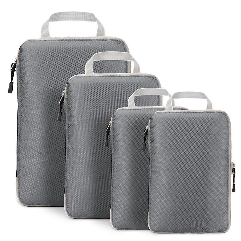 Four-Piece Compression Travel Storage Bag Set for Clothes, Toiletries, Digital Gear, and More