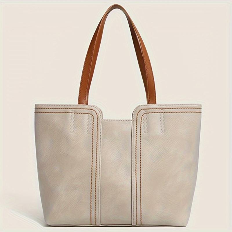 Stylish, elegant, simple, retro, large capacity shoulder bag for women s commuting with fixed shoulder strap, minimalist modern handbag