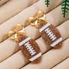 1 Pair Women's Winter Accessories Sequins Super Bowl Football Earrings Bow Stud Earrings Sports Fans Women