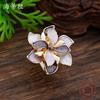New enamel color hollow geometric daffodil elastic ring women's fashion high-end flower ring