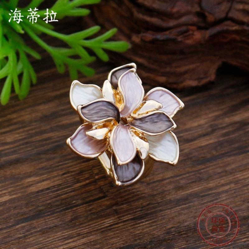 New enamel color hollow geometric daffodil elastic ring women's fashion high-end flower ring