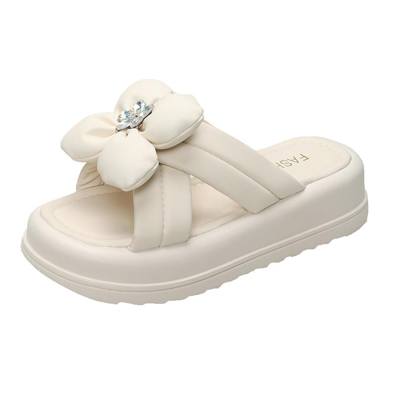 Thick-soled slippers female 2025 summer new Korean version fairy style Internet celebrity fashion muffin and one-word flower cool slippers