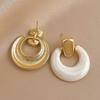 Retro Minimalist Geometric Circle Stud Earrings: Oil-Drip Steel Needle Design for Women
